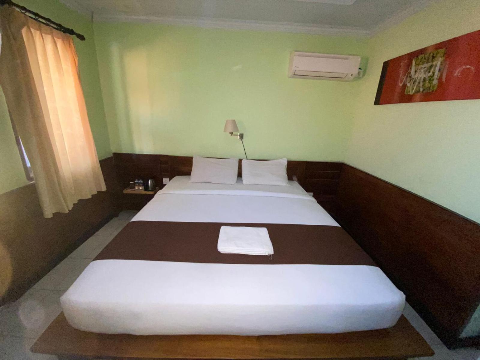 Dedy Beach Inn Кута Екстериор снимка