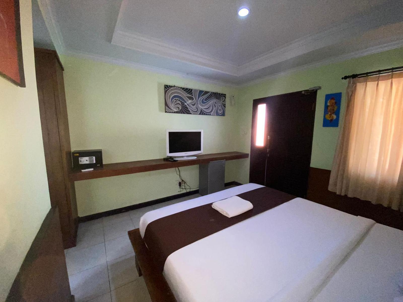 Dedy Beach Inn Кута Екстериор снимка