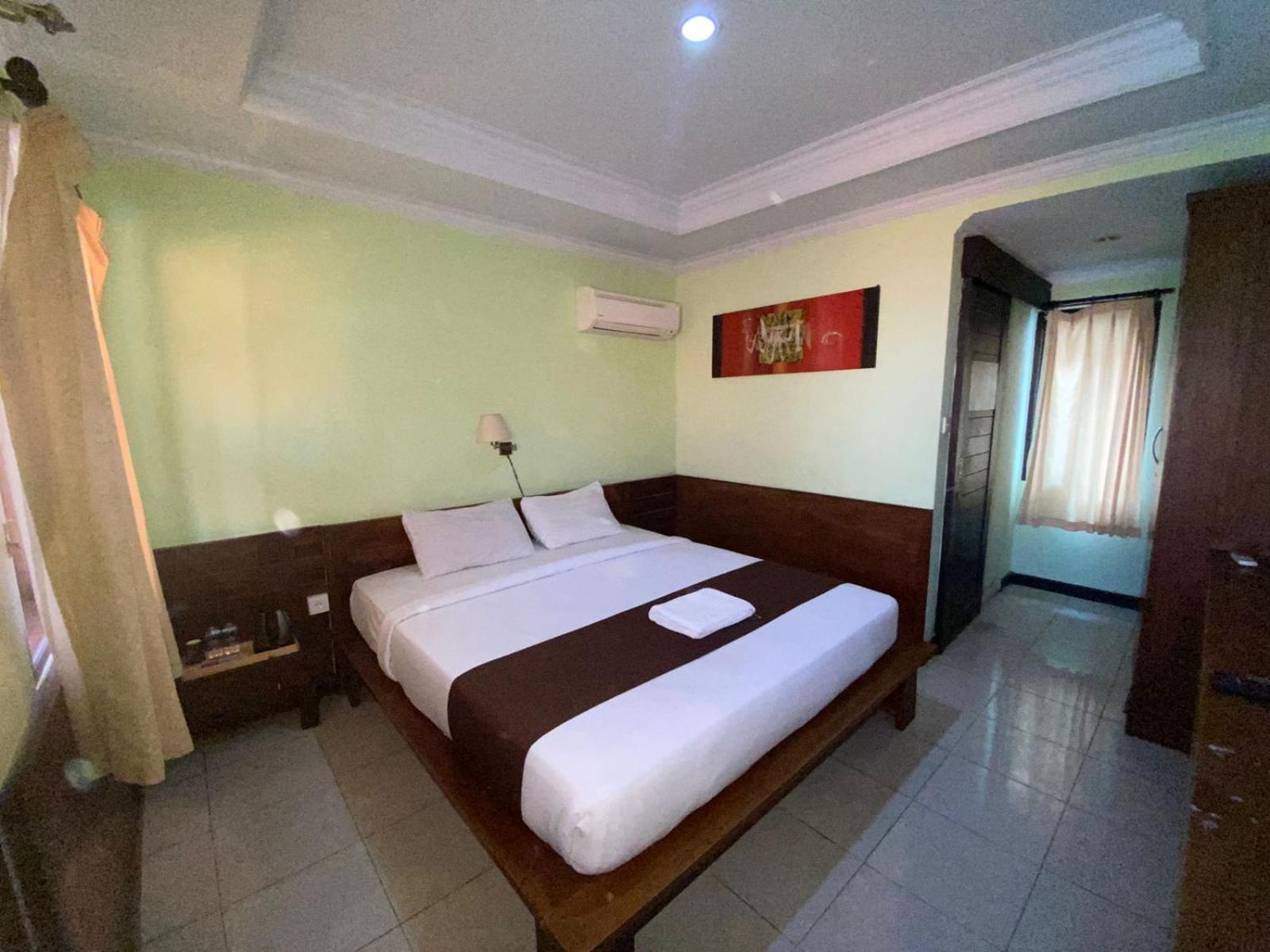 Dedy Beach Inn Кута Екстериор снимка
