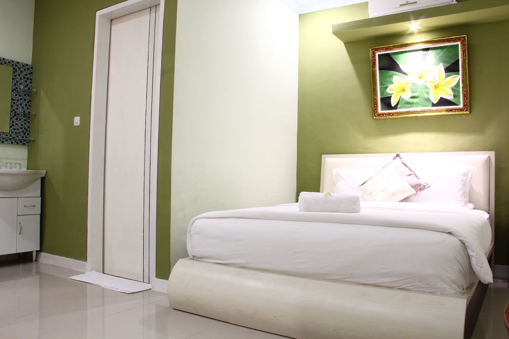 Dedy Beach Inn Кута Екстериор снимка